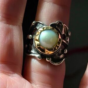 Hand crafted in Israel SS ring and real 18k gold With Fresh water Pearl.